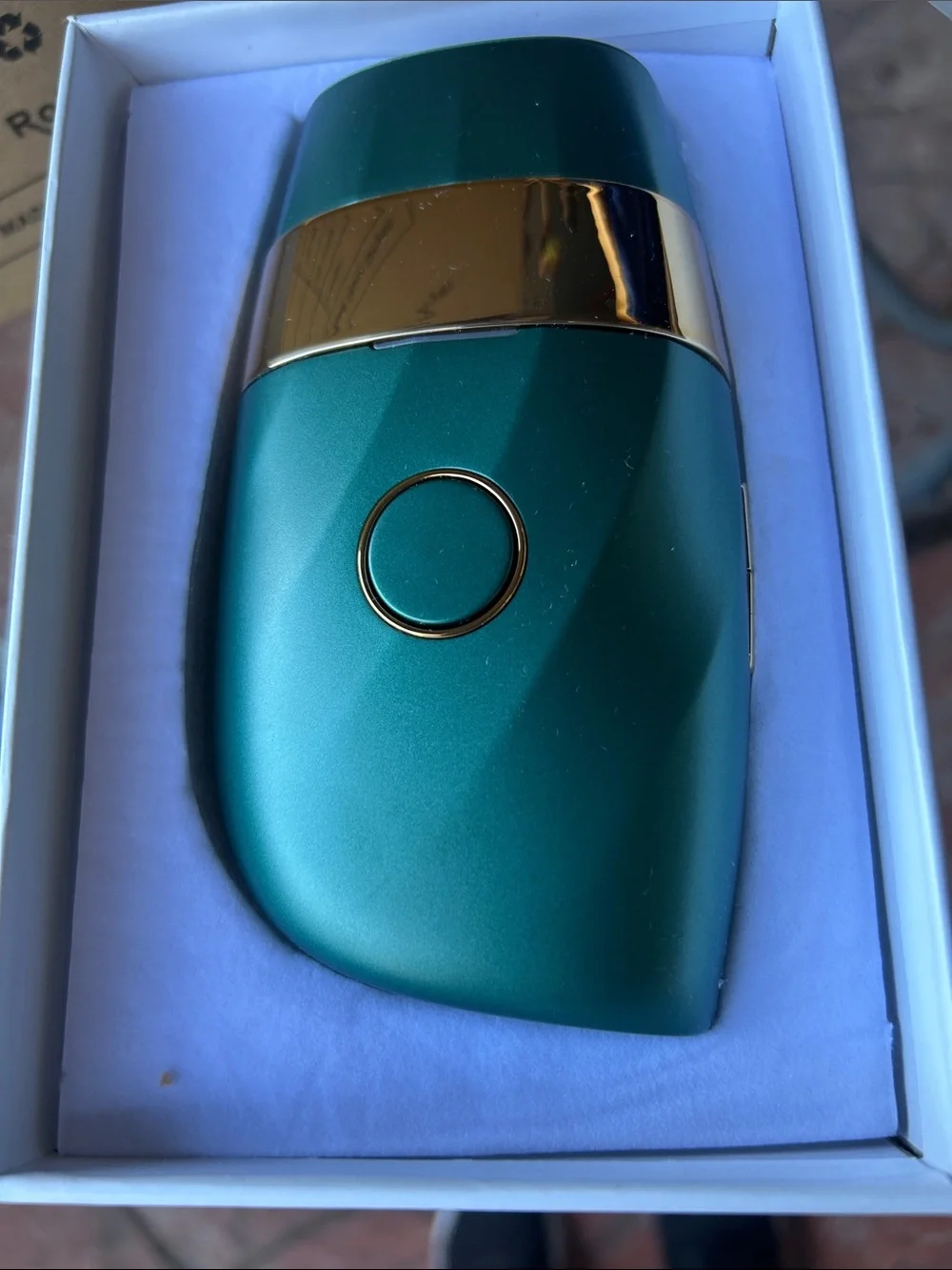 Teal and Gold Compact Hair Removal Accessory - Sleek Hair Styling Tool